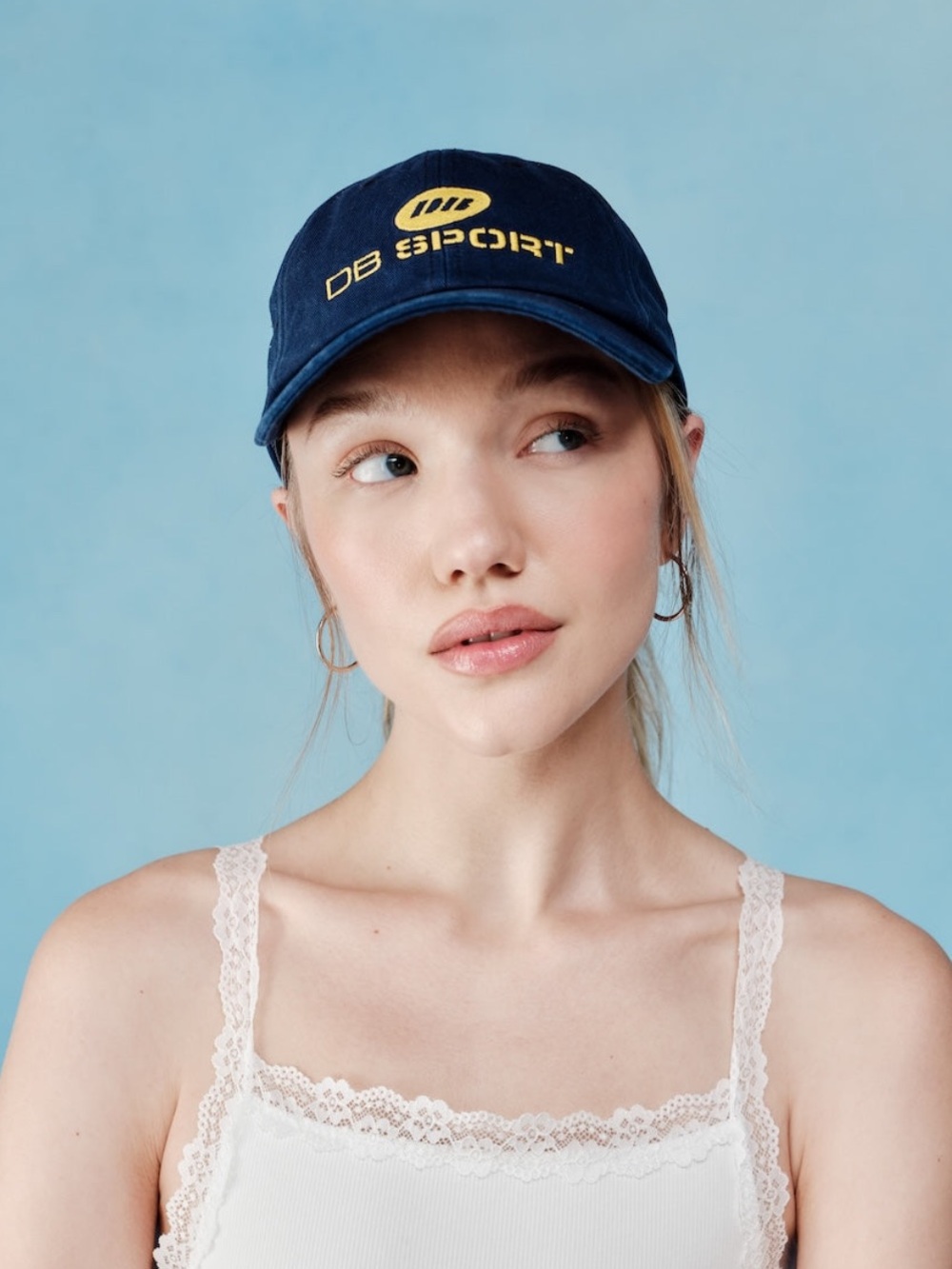 DB Sport Women's Navy Baseball Cap with Yellow Logo